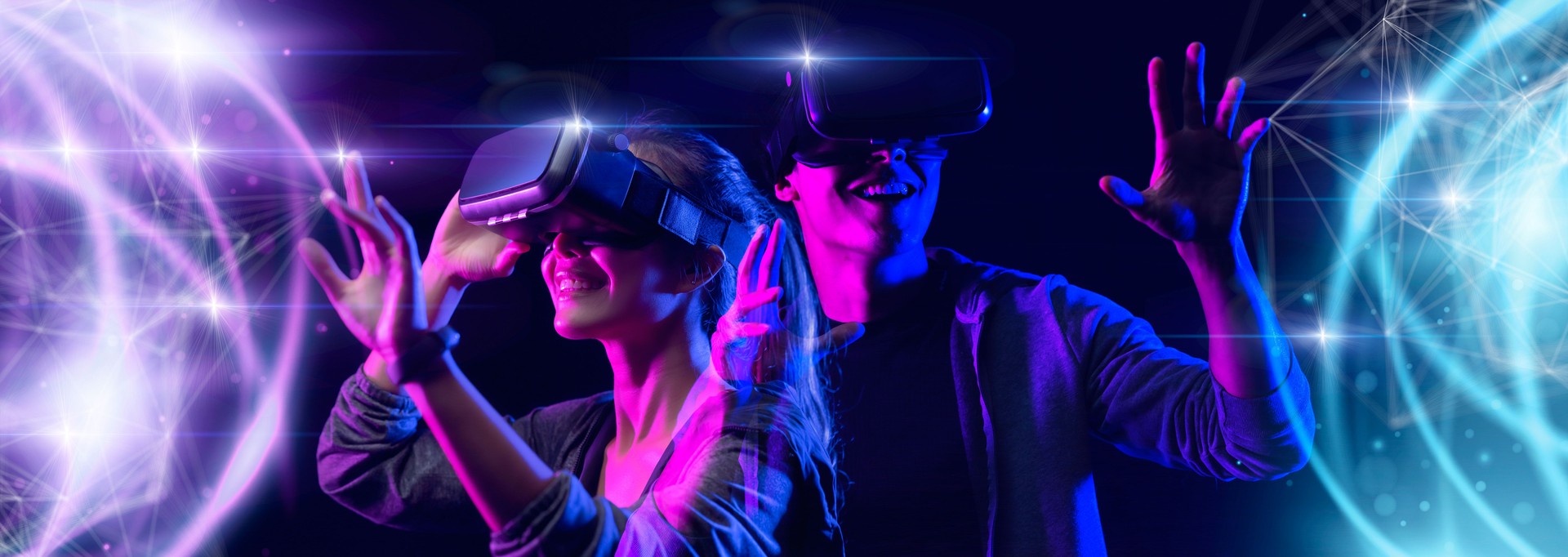 Teenager having fun play VR virtual reality glasses sport game 3D cyber space futuristic neon colorful background, future digital technology game and entertainment